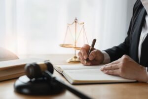Lawyer reviewing legal documents at desk